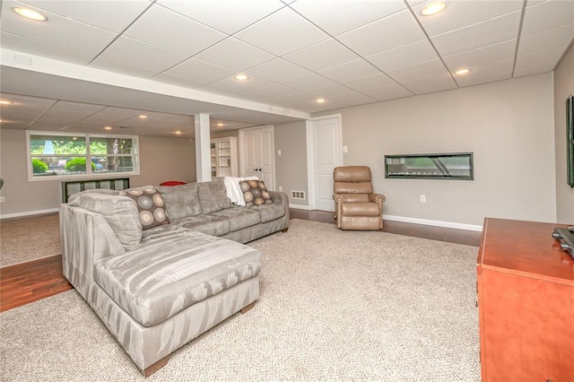23 Vouga Ln, Frontenac, MO 63131 - living area featuring baseboards, wood finished floors, recessed lighting, and carpet floors