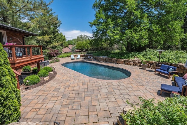 23 Vouga Ln, Frontenac, MO 63131 - view of swimming pool featuring a patio, a deck, and a fenced backyard