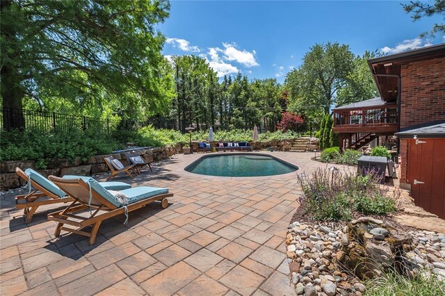 23 Vouga Ln, Frontenac, MO 63131 - view of swimming pool with stairway, a patio, and a deck
