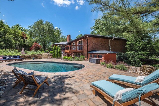 23 Vouga Ln, Frontenac, MO 63131 - outdoor pool with a patio area and a wooden deck