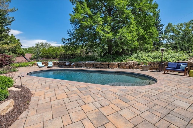 23 Vouga Ln, Frontenac, MO 63131 - view of swimming pool featuring a patio and a fenced backyard