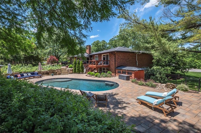 23 Vouga Ln, Frontenac, MO 63131 - outdoor pool with a wooden deck, a patio, and stairway