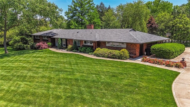 23 Vouga Ln, Frontenac, MO 63131 - ranch-style home with a front yard, a chimney, brick siding, and a shingled roof