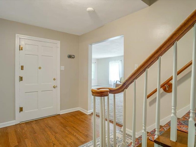 211 Country Club Ln, Belleville, IL 62223 - entryway with light wood-style flooring, stairs, and baseboards