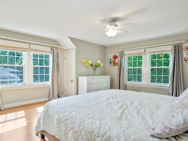 211 Country Club Ln, Belleville, IL 62223 - bedroom with wood finished floors, baseboards, and a ceiling fan
