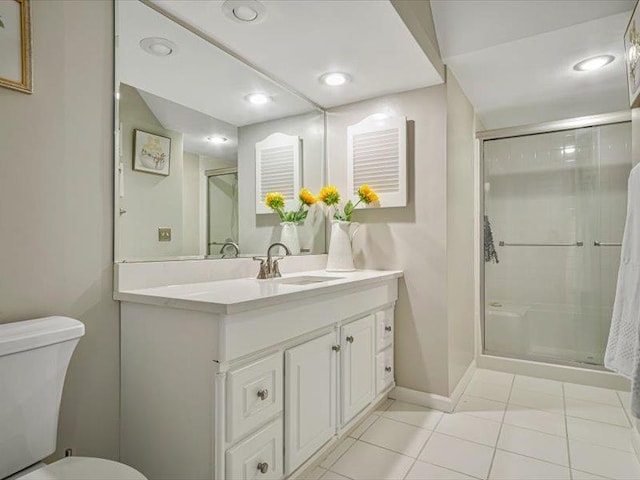211 Country Club Ln, Belleville, IL 62223 - full bathroom with toilet, a shower stall, vanity, tile patterned flooring, and recessed lighting