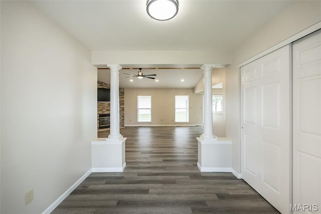 403 Autumn Farms Ct, Wentzville, MO 63385 - hallway with decorative columns, dark wood-style floors, and recessed lighting