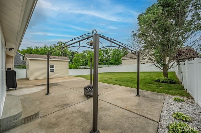 403 Autumn Farms Ct, Wentzville, MO 63385 - fenced backyard featuring a patio and an outdoor structure
