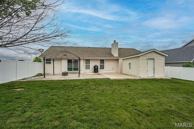 403 Autumn Farms Ct, Wentzville, MO 63385 - back of house featuring a patio, a chimney, and a fenced backyard