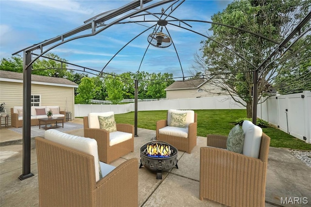 403 Autumn Farms Ct, Wentzville, MO 63385 - fenced backyard featuring an outdoor living space with a fire pit and a patio