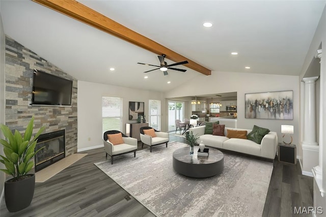 403 Autumn Farms Ct, Wentzville, MO 63385 - living room featuring dark wood-style floors, a stone fireplace, recessed lighting, and a ceiling fan