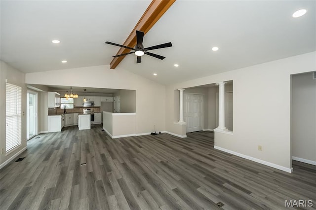403 Autumn Farms Ct, Wentzville, MO 63385 - unfurnished living room with decorative columns, dark wood-style floors, a ceiling fan, recessed lighting, and a chandelier