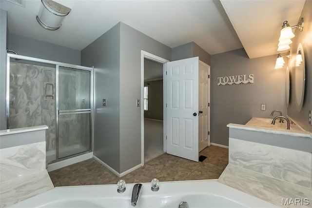 403 Autumn Farms Ct, Wentzville, MO 63385 - full bathroom with a tub with marble appearance, a stall shower, and vanity