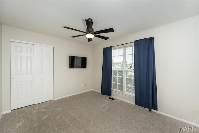 403 Autumn Farms Ct, Wentzville, MO 63385 - unfurnished bedroom with a closet, carpet floors, and ceiling fan