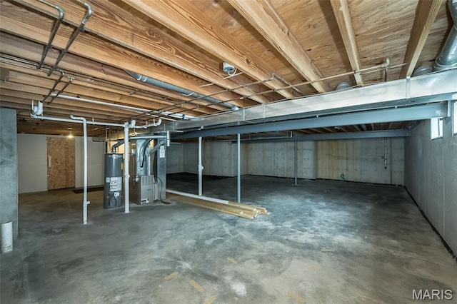 403 Autumn Farms Ct, Wentzville, MO 63385 - unfinished basement featuring gas water heater and heating unit