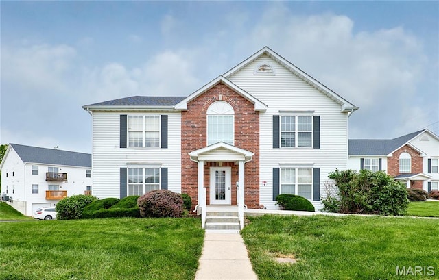 9 Homefield Gardens Dr Unit 31N, Ofallon, MO 63366 - view of front of house with a front lawn