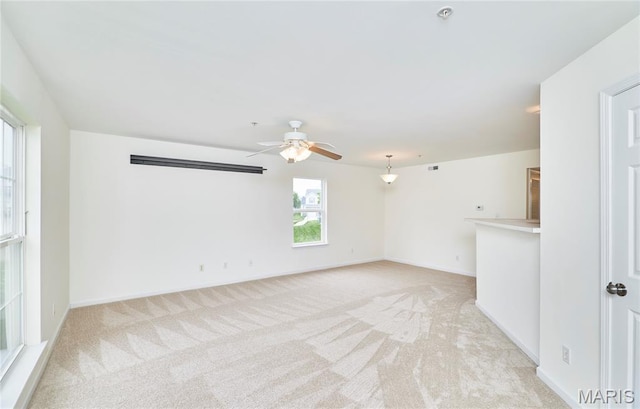 9 Homefield Gardens Dr Unit 31N, Ofallon, MO 63366 - spare room with a ceiling fan, light colored carpet, a pendent fire sprinkler, and baseboards