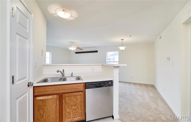 9 Homefield Gardens Dr Unit 31N, Ofallon, MO 63366 - kitchen featuring dishwasher, a sink, light colored carpet, and plenty of natural light
