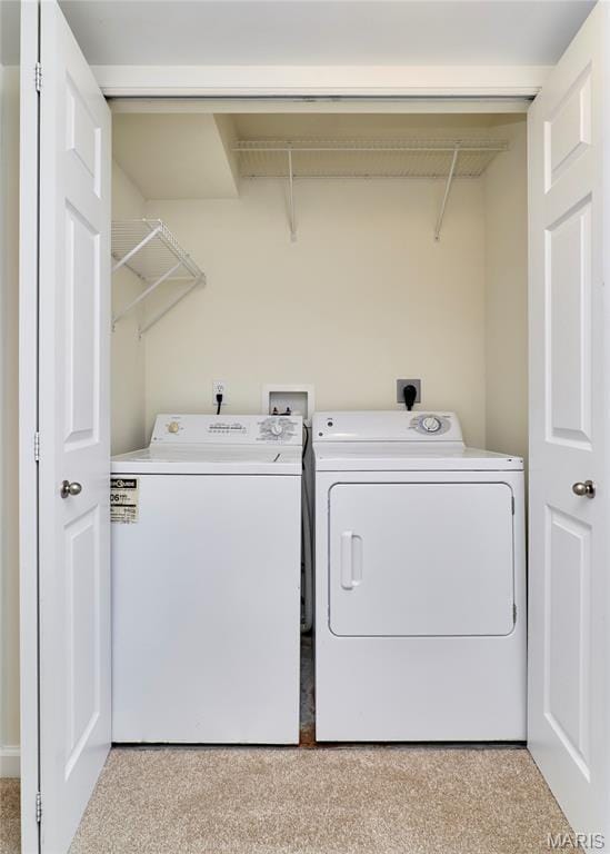 9 Homefield Gardens Dr Unit 31N, Ofallon, MO 63366 - laundry area featuring washing machine and clothes dryer