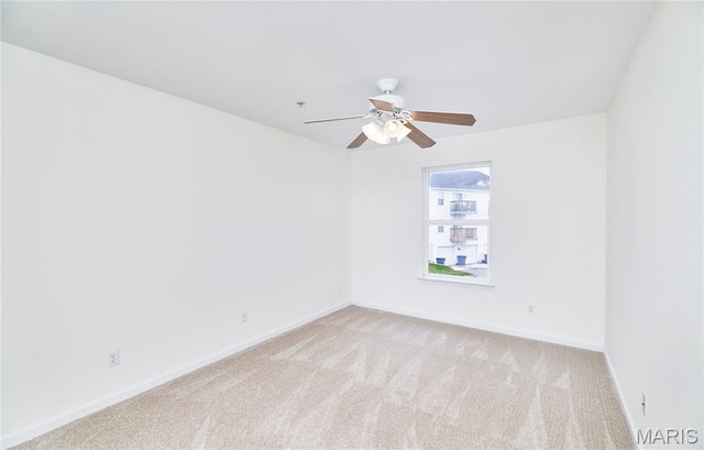 9 Homefield Gardens Dr Unit 31N, Ofallon, MO 63366 - unfurnished room with carpet, baseboards, and a ceiling fan