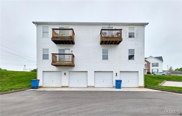 9 Homefield Gardens Dr Unit 31N, Ofallon, MO 63366 - rear view of property featuring a balcony and an attached garage