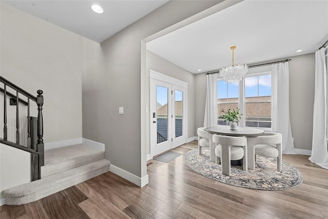 3516 Broad St, Saint Charles, MO 63301 - dining room with stairway, a chandelier, baseboards, healthy amount of natural light, and recessed lighting