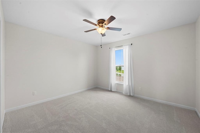 3516 Broad St, Saint Charles, MO 63301 - empty room featuring ceiling fan, light colored carpet, and baseboards