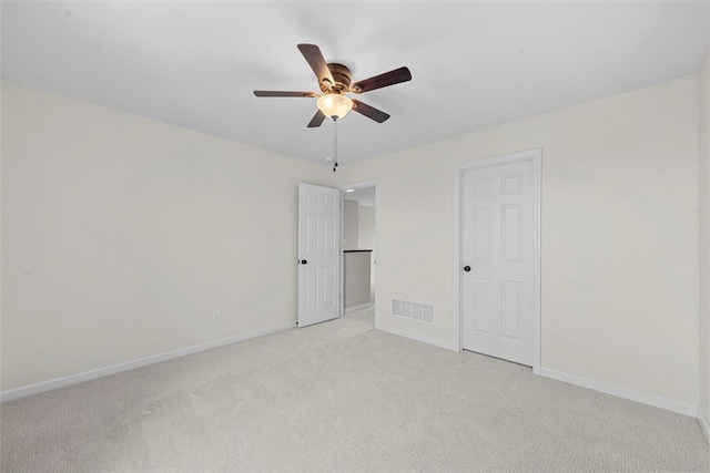 3516 Broad St, Saint Charles, MO 63301 - unfurnished bedroom featuring light colored carpet, baseboards, and a ceiling fan