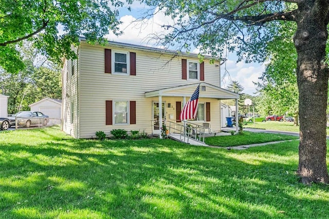 33 Saint Celeste Dr, Florissant, MO 63031 - view of front of home with a porch and a front yard