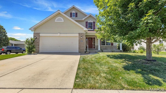 1101 Gulfstream Way, Mascoutah, IL 62258 - traditional home with brick siding, concrete driveway, a front yard, and a garage