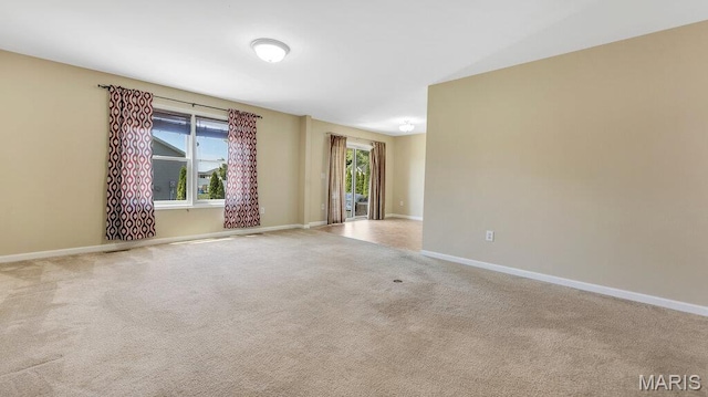 1101 Gulfstream Way, Mascoutah, IL 62258 - carpeted spare room featuring baseboards