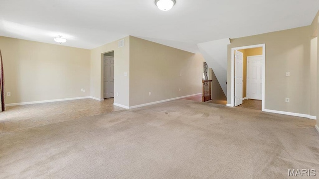 1101 Gulfstream Way, Mascoutah, IL 62258 - unfurnished living room featuring carpet flooring and baseboards