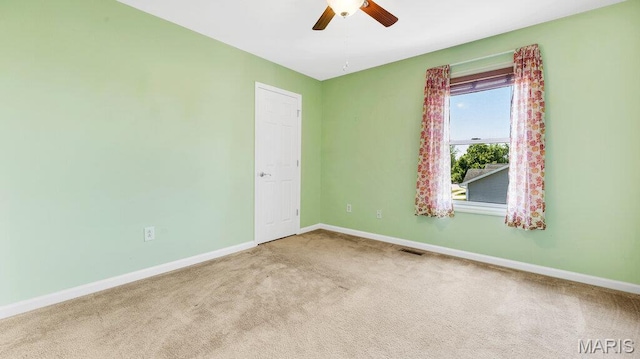 1101 Gulfstream Way, Mascoutah, IL 62258 - carpeted spare room with ceiling fan and baseboards