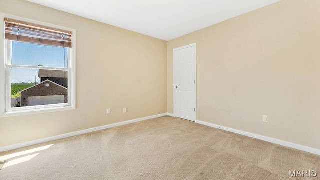 1101 Gulfstream Way, Mascoutah, IL 62258 - carpeted spare room with baseboards