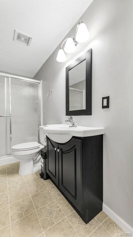1101 Gulfstream Way, Mascoutah, IL 62258 - bathroom with vanity, a stall shower, and tile patterned floors