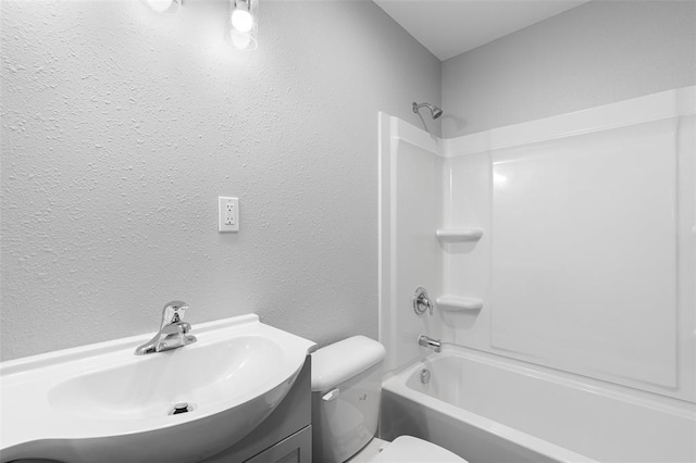 418 Williams St, Pacific, MO 63069 - full bath with toilet, bathing tub / shower combination, a textured wall, and vanity