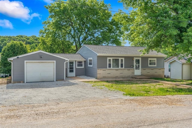 418 Williams St, Pacific, MO 63069 - ranch-style house with dirt driveway, brick siding, and a garage