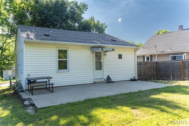 108 Tomlinson St, East Alton, IL 62024 - rear view of property featuring a patio and roof with shingles