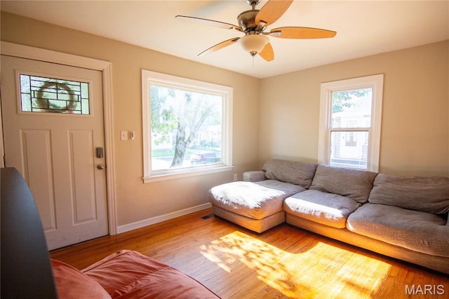 108 Tomlinson St, East Alton, IL 62024 - living room featuring plenty of natural light, wood finished floors, and ceiling fan