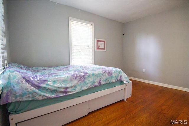 108 Tomlinson St, East Alton, IL 62024 - bedroom with wood finished floors and baseboards