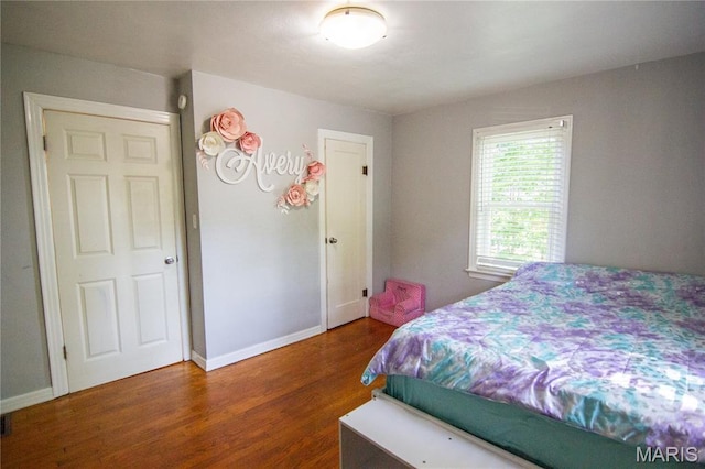 108 Tomlinson St, East Alton, IL 62024 - bedroom featuring wood finished floors and baseboards
