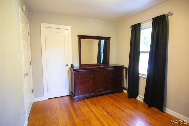 108 Tomlinson St, East Alton, IL 62024 - bedroom featuring wood finished floors and baseboards