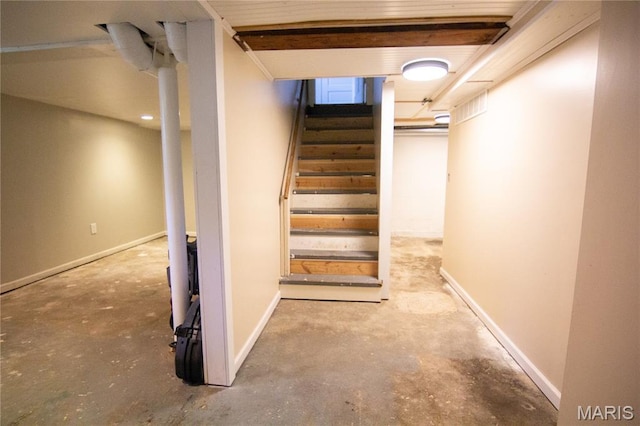 108 Tomlinson St, East Alton, IL 62024 - staircase with unfinished concrete flooring
