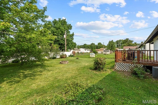 2851 Quenley St, Saint Charles, MO 63301 - view of yard featuring an outdoor fire pit and a deck
