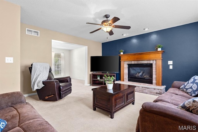 2711 Cascade Lake Dr, Shiloh, IL 62221 - living room featuring ceiling fan, carpet flooring, a fireplace, and baseboards