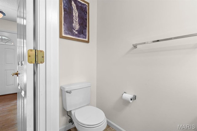 2711 Cascade Lake Dr, Shiloh, IL 62221 - bathroom with toilet, baseboards, and wood finished floors