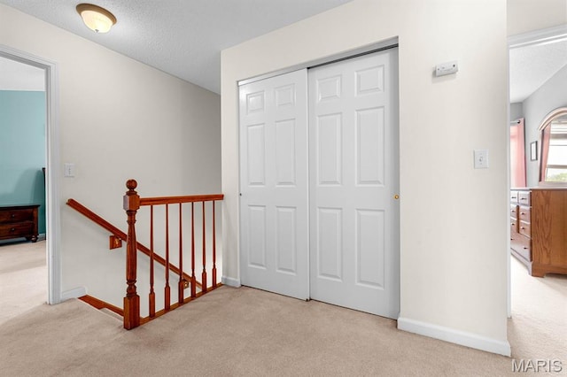 2711 Cascade Lake Dr, Shiloh, IL 62221 - corridor with carpet floors, an upstairs landing, and baseboards