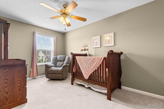 2711 Cascade Lake Dr, Shiloh, IL 62221 - carpeted bedroom with baseboards, a ceiling fan, and a textured ceiling