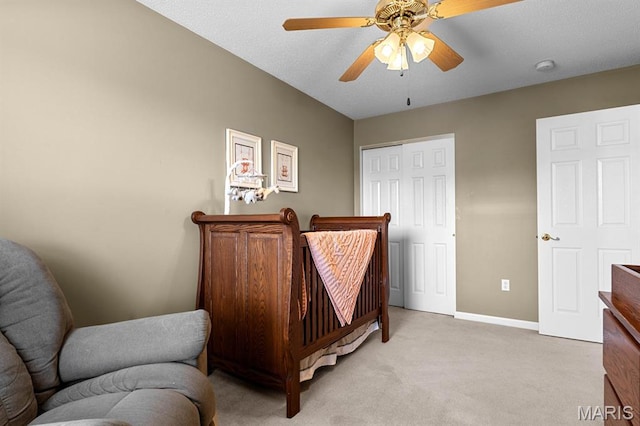 2711 Cascade Lake Dr, Shiloh, IL 62221 - bedroom with light colored carpet, baseboards, a closet, and a ceiling fan