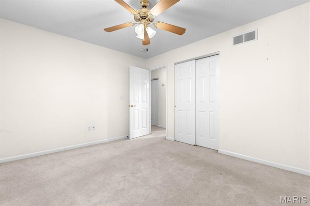 2711 Cascade Lake Dr, Shiloh, IL 62221 - unfurnished bedroom with baseboards, carpet flooring, a closet, and ceiling fan
